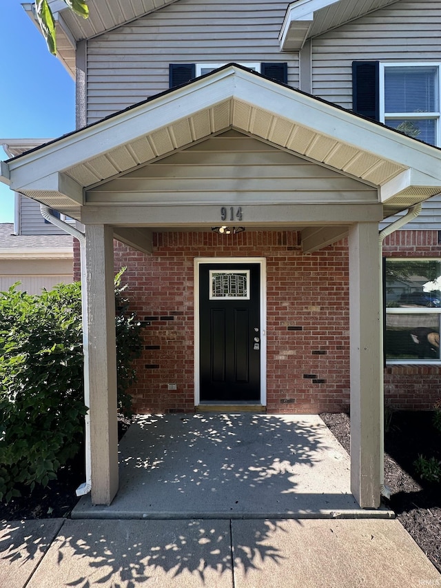 914 Braxton Dr N, Lafayette, IN 47909 - doorway to property with brick siding