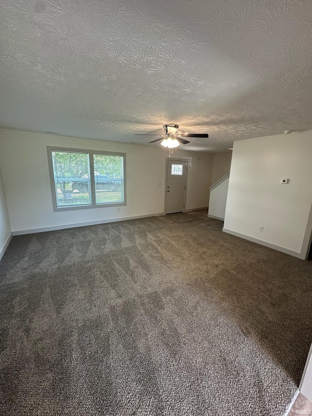 914 Braxton Dr N, Lafayette, IN 47909 - unfurnished living room featuring a textured ceiling, ceiling fan, and carpet floors