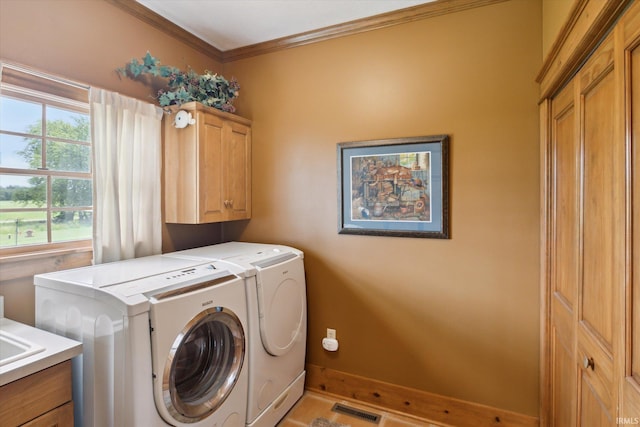 64052 State Road 331st Hwy, South Bend, IN 46614 - laundry room featuring independent washer and dryer, cabinet space, and crown molding