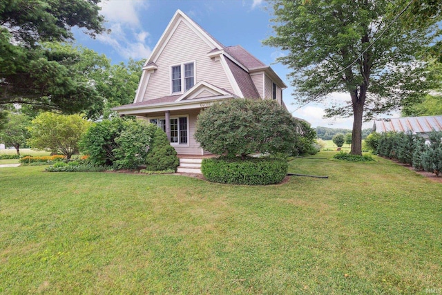 64052 State Road 331st Hwy, South Bend, IN 46614 - view of front facade with a front lawn and covered porch