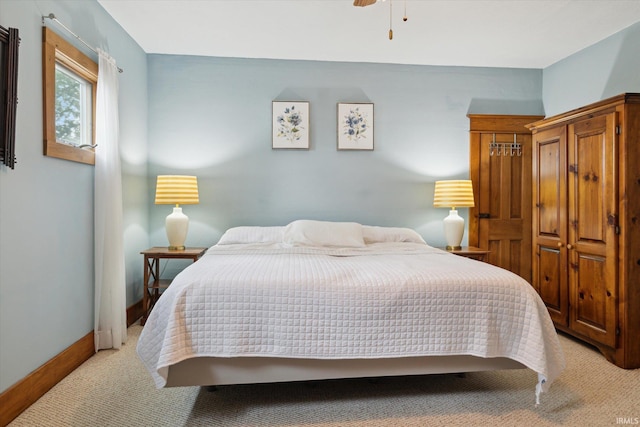64052 State Road 331st Hwy, South Bend, IN 46614 - bedroom with light colored carpet and a ceiling fan
