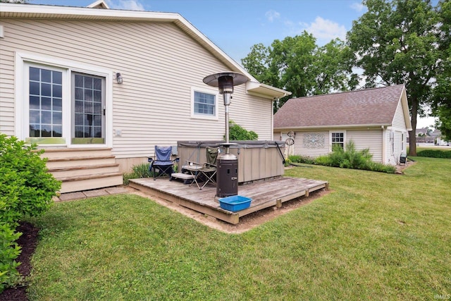 64052 State Road 331st Hwy, South Bend, IN 46614 - rear view of property with a hot tub, a deck, entry steps, and a lawn