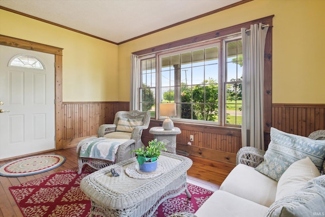 64052 State Road 331st Hwy, South Bend, IN 46614 - living room with wainscoting, hardwood / wood-style floors, wooden walls, and crown molding