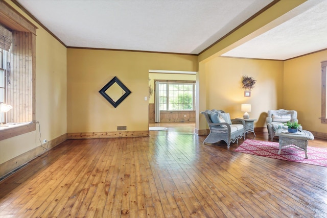 64052 State Road 331st Hwy, South Bend, IN 46614 - living area with crown molding and hardwood / wood-style floors