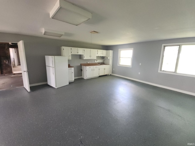 3742 N Indian Creek Rd, Logansport, IN 46947 - unfurnished living room with baseboards
