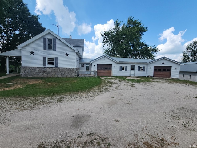 3742 N Indian Creek Rd, Logansport, IN 46947 - view of front of property with an attached garage and dirt driveway
