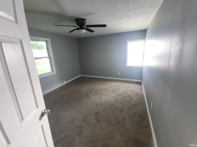 3742 N Indian Creek Rd, Logansport, IN 46947 - carpeted empty room with a baseboard radiator, healthy amount of natural light, a textured ceiling, and a ceiling fan