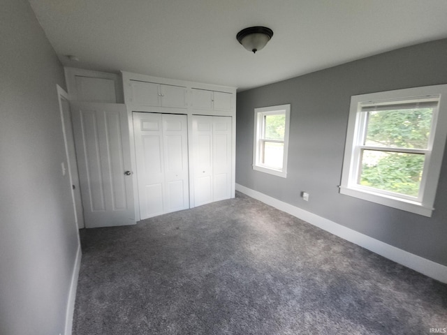3742 N Indian Creek Rd, Logansport, IN 46947 - unfurnished bedroom featuring a closet and carpet floors