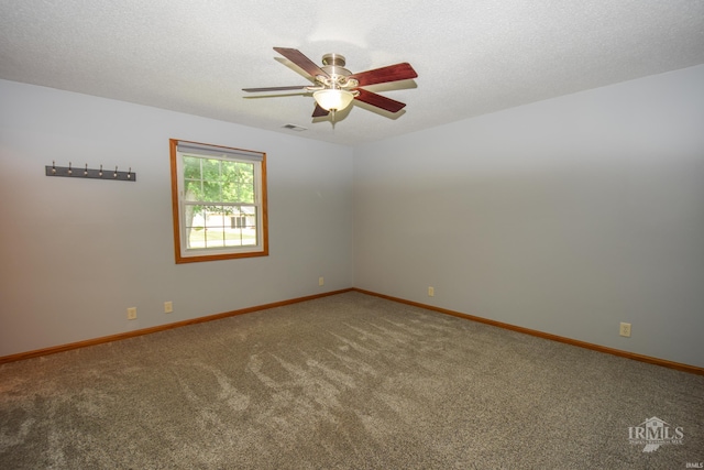 475 Gillcrest Dr, Albany, IN 47320 - empty room with carpet floors, ceiling fan, and a textured ceiling