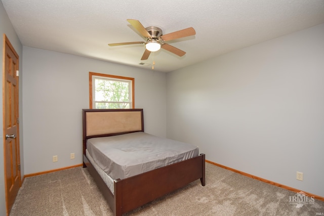 475 Gillcrest Dr, Albany, IN 47320 - carpeted bedroom with baseboards and a ceiling fan