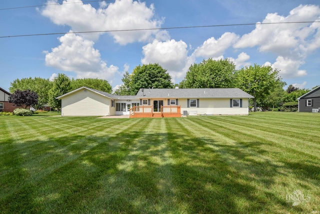 475 Gillcrest Dr, Albany, IN 47320 - back of property with a lawn and a deck