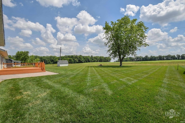 475 Gillcrest Dr, Albany, IN 47320 - view of green lawn with a deck