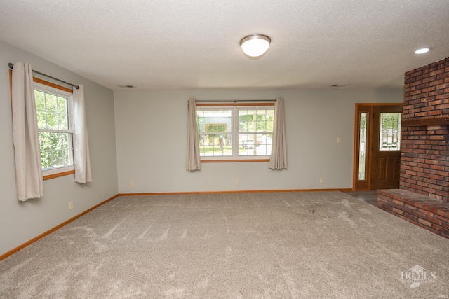 475 Gillcrest Dr, Albany, IN 47320 - unfurnished room with a textured ceiling and carpet floors