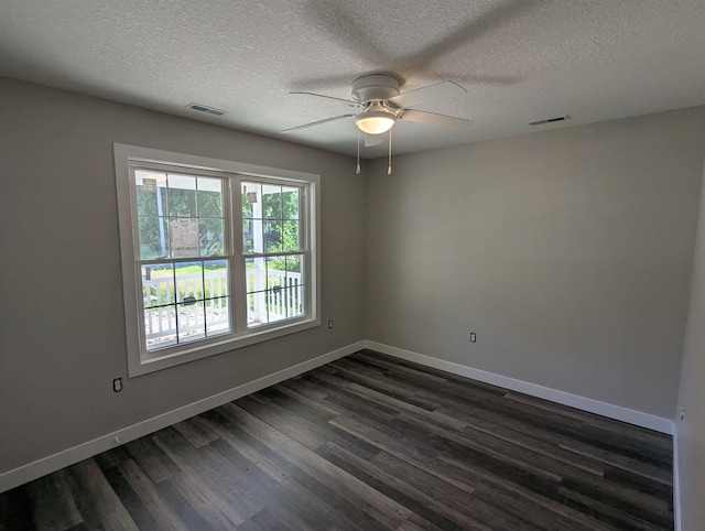 2206 24th Ave, Fort Wayne, IN 46802 - empty room featuring a ceiling fan, dark wood-style floors, and a textured ceiling