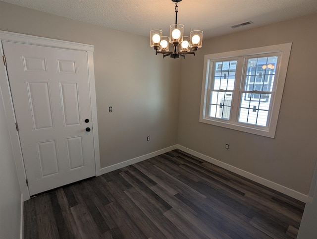 2206 24th Ave, Fort Wayne, IN 46802 - spare room with a chandelier and dark wood-style floors