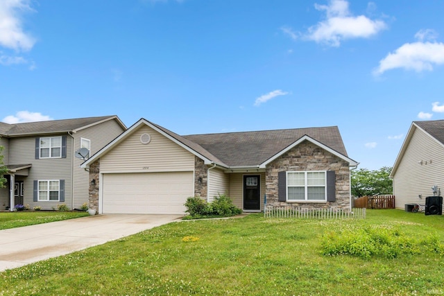 12216 Jacobas Pl, Fort Wayne, IN 46845 - view of front of property with stone siding, a garage, and concrete driveway