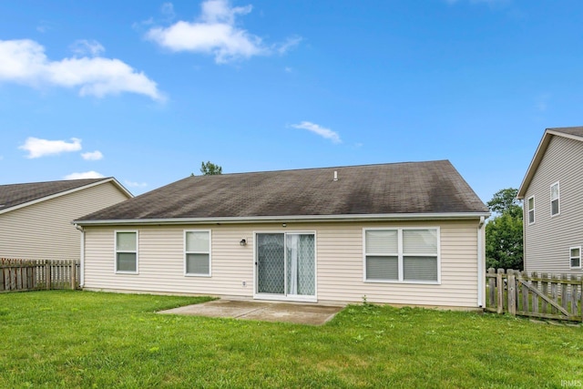 12216 Jacobas Pl, Fort Wayne, IN 46845 - back of property with a fenced backyard, a patio area, and roof with shingles