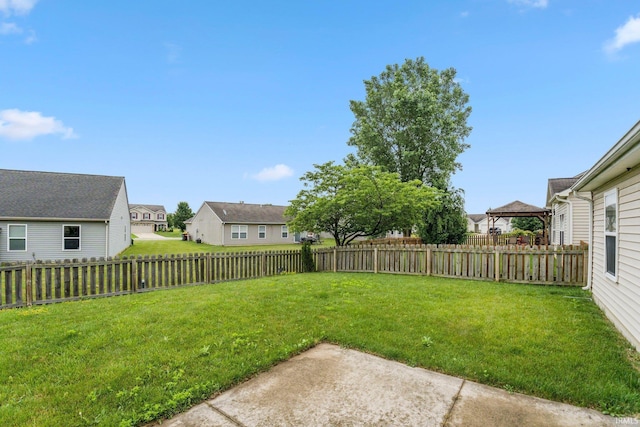 12216 Jacobas Pl, Fort Wayne, IN 46845 - fenced backyard with a residential view and a patio