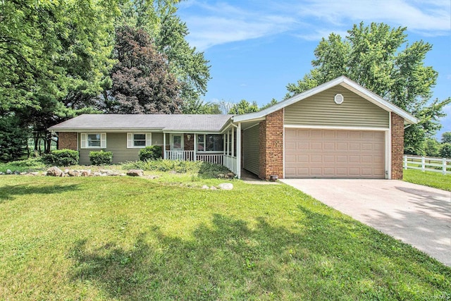 18055 Thomas Ln, Goshen, IN 46528 - ranch-style home featuring a porch, an attached garage, concrete driveway, and brick siding