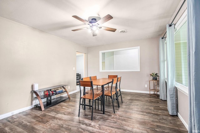 18055 Thomas Ln, Goshen, IN 46528 - dining space featuring a ceiling fan and dark wood-type flooring