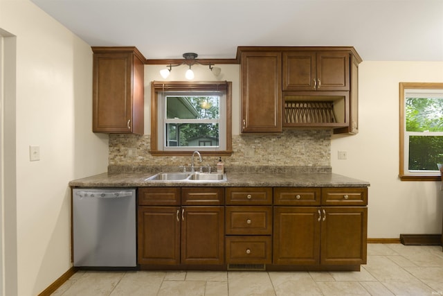 3617 Kirkfield Dr, Fort Wayne, IN 46815 - kitchen with dishwasher, dark countertops, and decorative backsplash