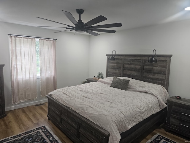 11016 Lakeview Rd, Kewanna, IN 46939 - bedroom with wood finished floors and a ceiling fan