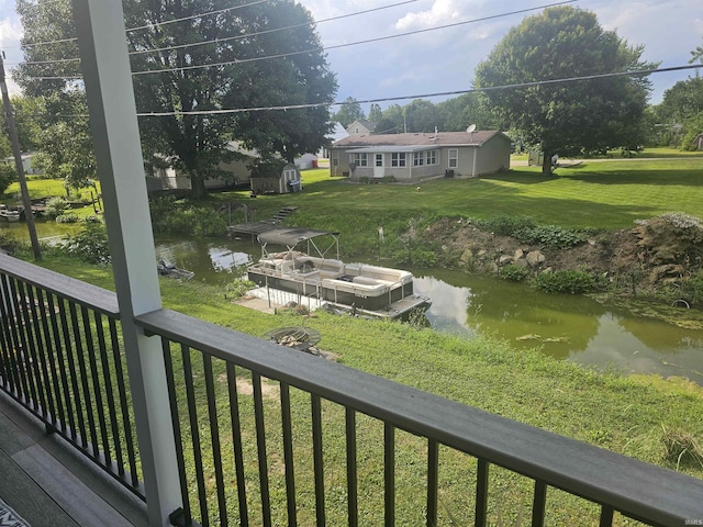 11016 Lakeview Rd, Kewanna, IN 46939 - deck featuring a floating dock, a lawn, and a water view