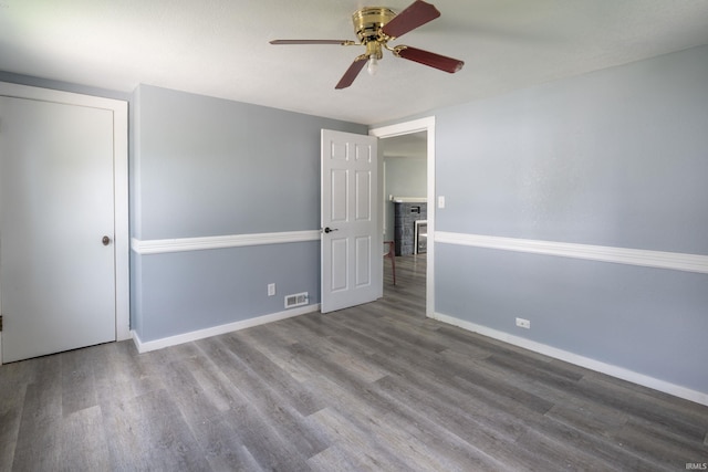 1201 Canal St, New Haven, IN 46774 - unfurnished bedroom featuring wood finished floors and a ceiling fan