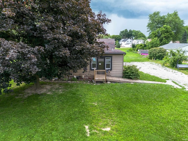 1201 Canal St, New Haven, IN 46774 - view of green lawn featuring a wooden deck