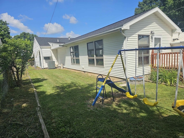 922 21st St, Logansport, IN 46947 - back of house with a yard and a playground