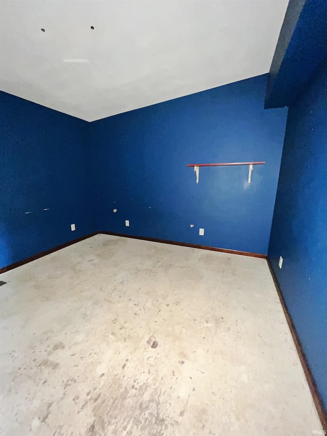 4524 E 800 N, Ossian, IN 46777 - spare room featuring baseboards and unfinished concrete floors