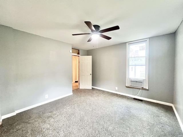 251 E 5th St, Peru, IN 46970 - unfurnished bedroom featuring carpet, cooling unit, and ceiling fan