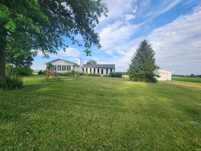 8276 N 100th Rd, Uniondale, IN 46791 - view of grassy yard with a playground