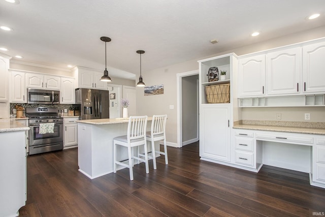 57329 Orchard Ridge Dr, Elkhart, IN 46516 - kitchen with stainless steel appliances, open shelves, white cabinetry, dark wood-style floors, and a center island