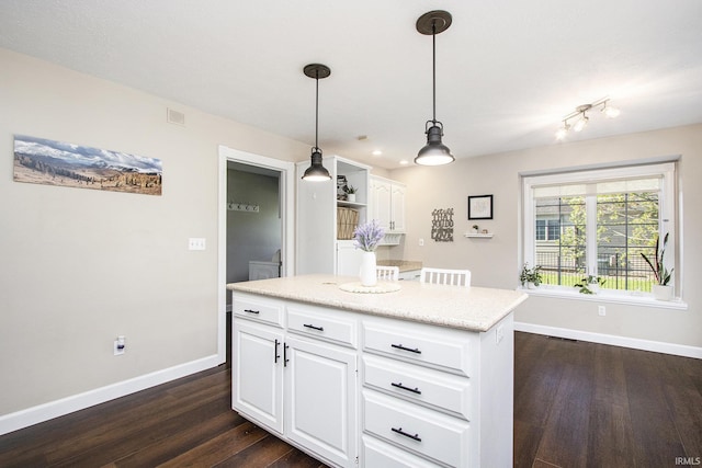 57329 Orchard Ridge Dr, Elkhart, IN 46516 - kitchen with dark wood finished floors, white cabinets, pendant lighting, a kitchen island, and open shelves