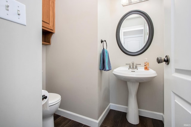 57329 Orchard Ridge Dr, Elkhart, IN 46516 - half bathroom with wood finished floors and toilet
