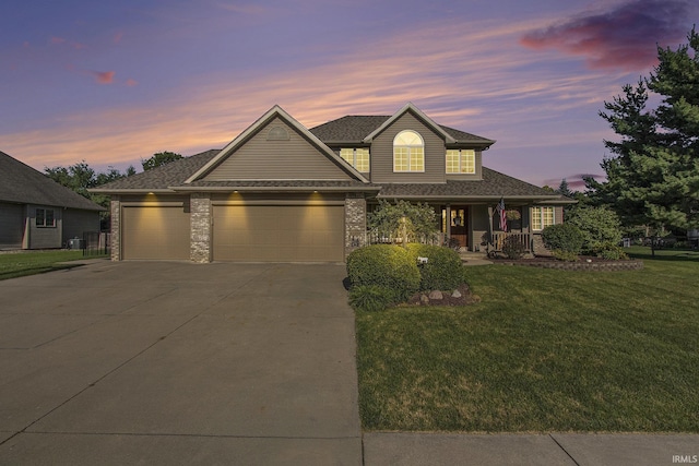 57329 Orchard Ridge Dr, Elkhart, IN 46516 - traditional home featuring an attached garage, driveway, a front lawn, a porch, and roof with shingles