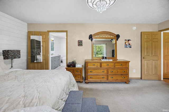 12856 W Bicycle Bridge Rd, Battle Ground, IN 47920 - carpeted bedroom with a chandelier and ensuite bath