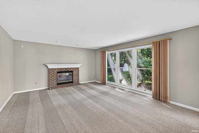 14276 Old Pine Ln, Mishawaka, IN 46545 - unfurnished living room featuring carpet flooring and a fireplace