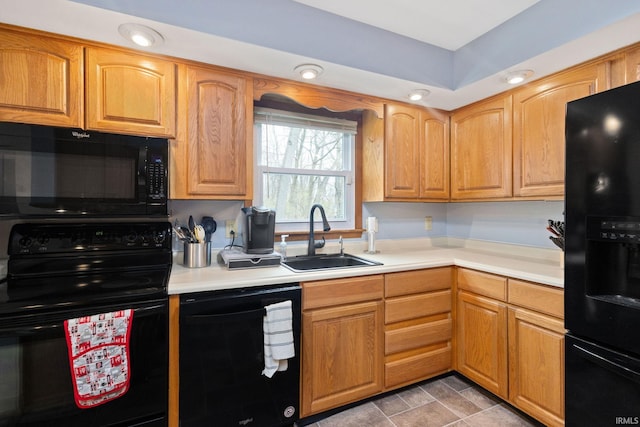 26247 Douglas Ave, Elkhart, IN 46514 - kitchen featuring black appliances and light countertops