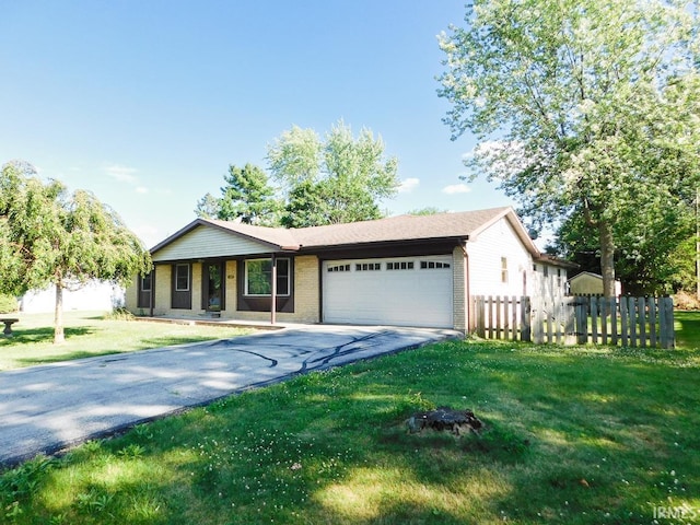 185 W Mercury St, Markle, IN 46770 - ranch-style home with asphalt driveway, an attached garage, brick siding, and a porch