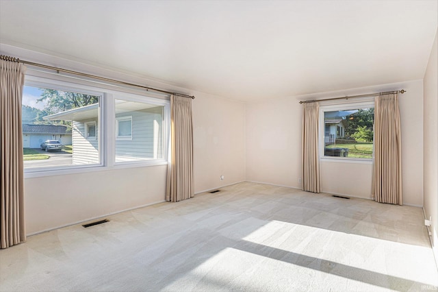 3303 Hilltop Dr, South Bend, IN 46614 - unfurnished room featuring carpet flooring and healthy amount of natural light