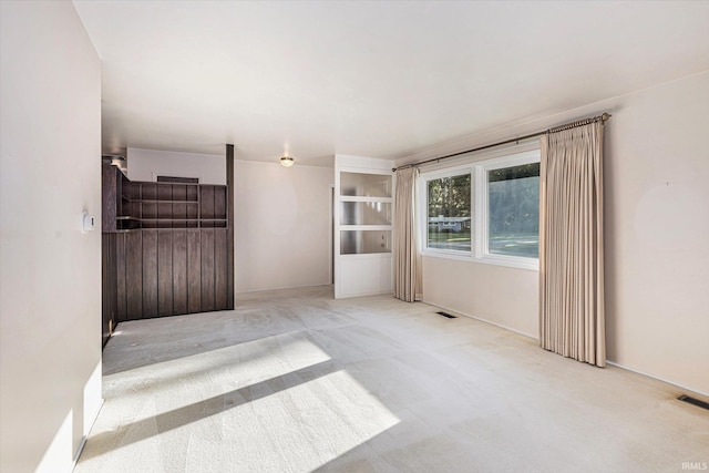 3303 Hilltop Dr, South Bend, IN 46614 - unfurnished living room featuring carpet flooring