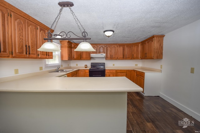 4044 S Younkin Dr, Redkey, IN 47373 - kitchen with black / electric stove, under cabinet range hood, a peninsula, light countertops, and a textured ceiling
