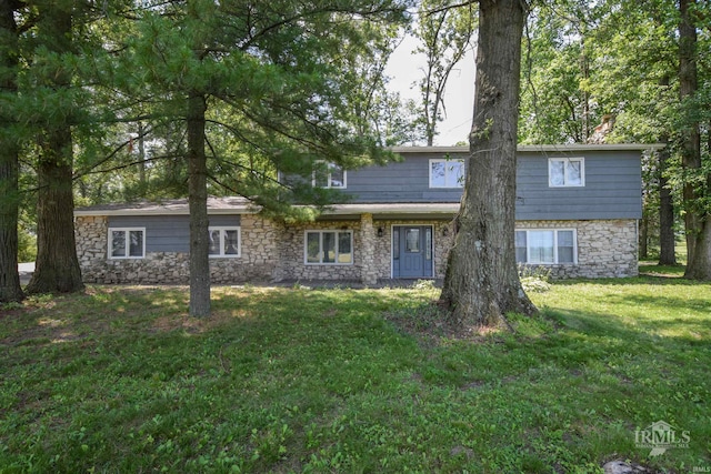 4044 S Younkin Dr, Redkey, IN 47373 - view of front of house with stone siding and a front lawn