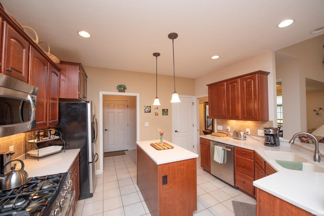 344 Rosebank Ln, West Lafayette, IN 47906 - kitchen with stainless steel appliances, a kitchen island, backsplash, light countertops, and recessed lighting