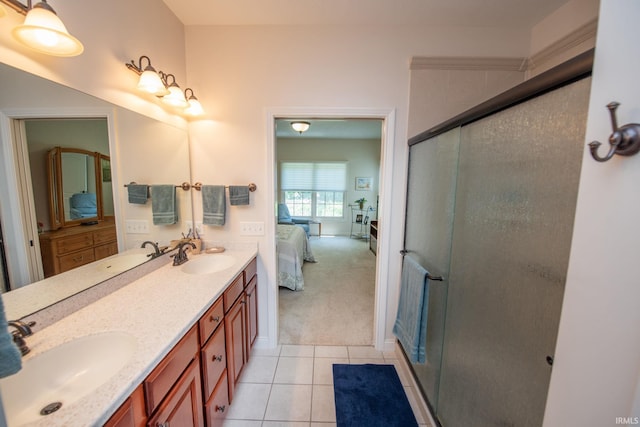 344 Rosebank Ln, West Lafayette, IN 47906 - ensuite bathroom featuring double vanity, tile patterned floors, and a shower stall