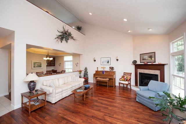 344 Rosebank Ln, West Lafayette, IN 47906 - living room with a chandelier, wood finished floors, a fireplace, recessed lighting, and high vaulted ceiling