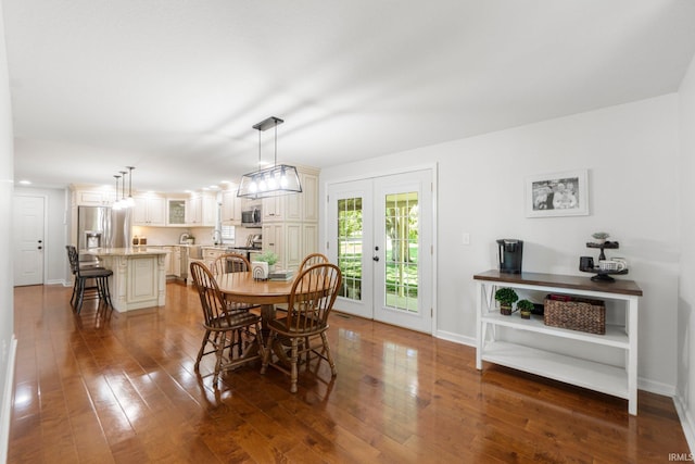 1704 S Sutton Circle Dr, Bluffton, IN 46714 - dining room featuring wood-type flooring and baseboards