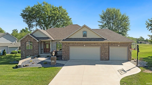 1669 E Brookside Trl, Columbia City, IN 46725 - craftsman house with a garage, concrete driveway, brick siding, and a front lawn
